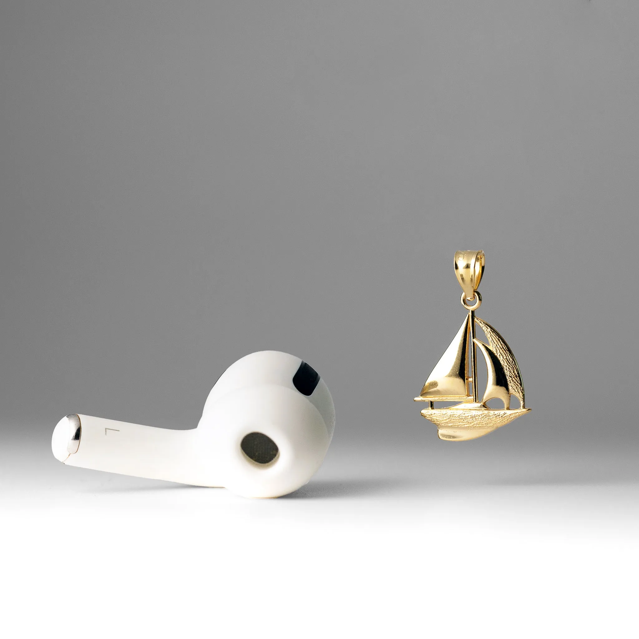Gold Sailboat Pendant