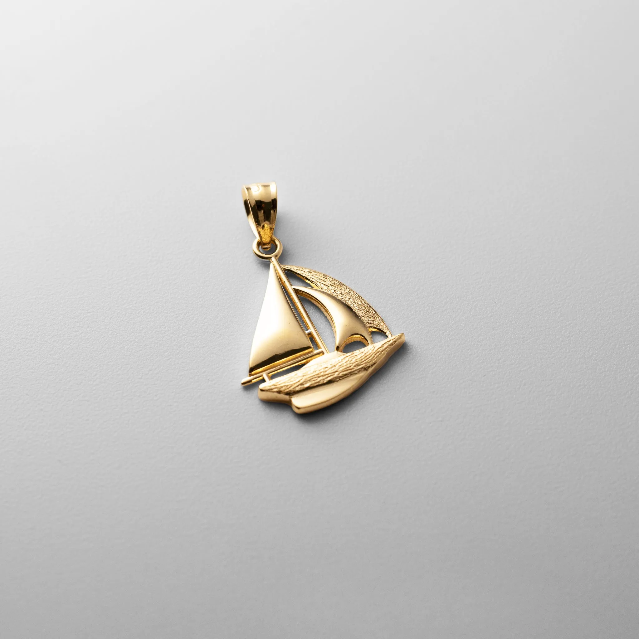 Gold Sailboat Pendant