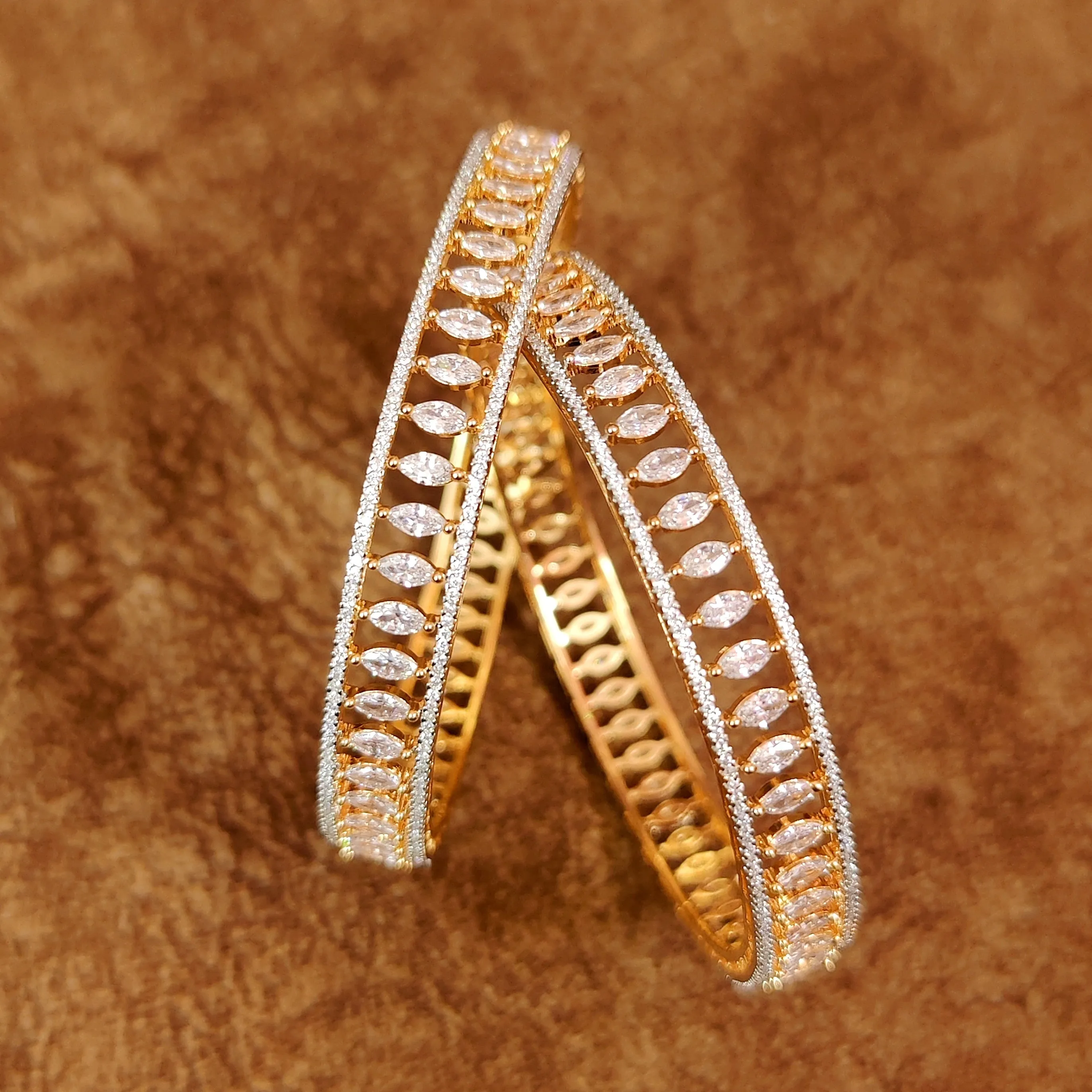MARQUESE SHAPED AD STUDDED GOLD BANGLES