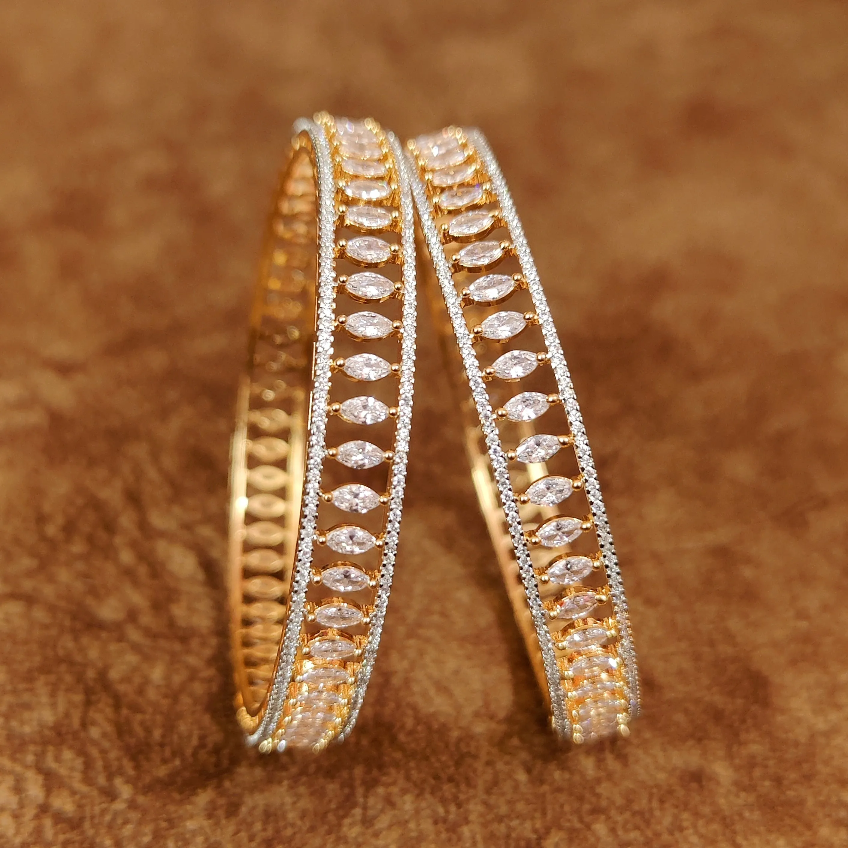 MARQUESE SHAPED AD STUDDED GOLD BANGLES