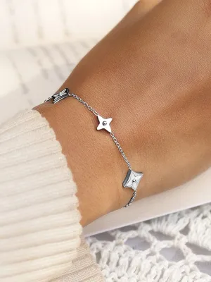 Rubans Voguish Rhodium Plated StainlessSteel TarnishFree Waterproof Floral Charm Bracelet