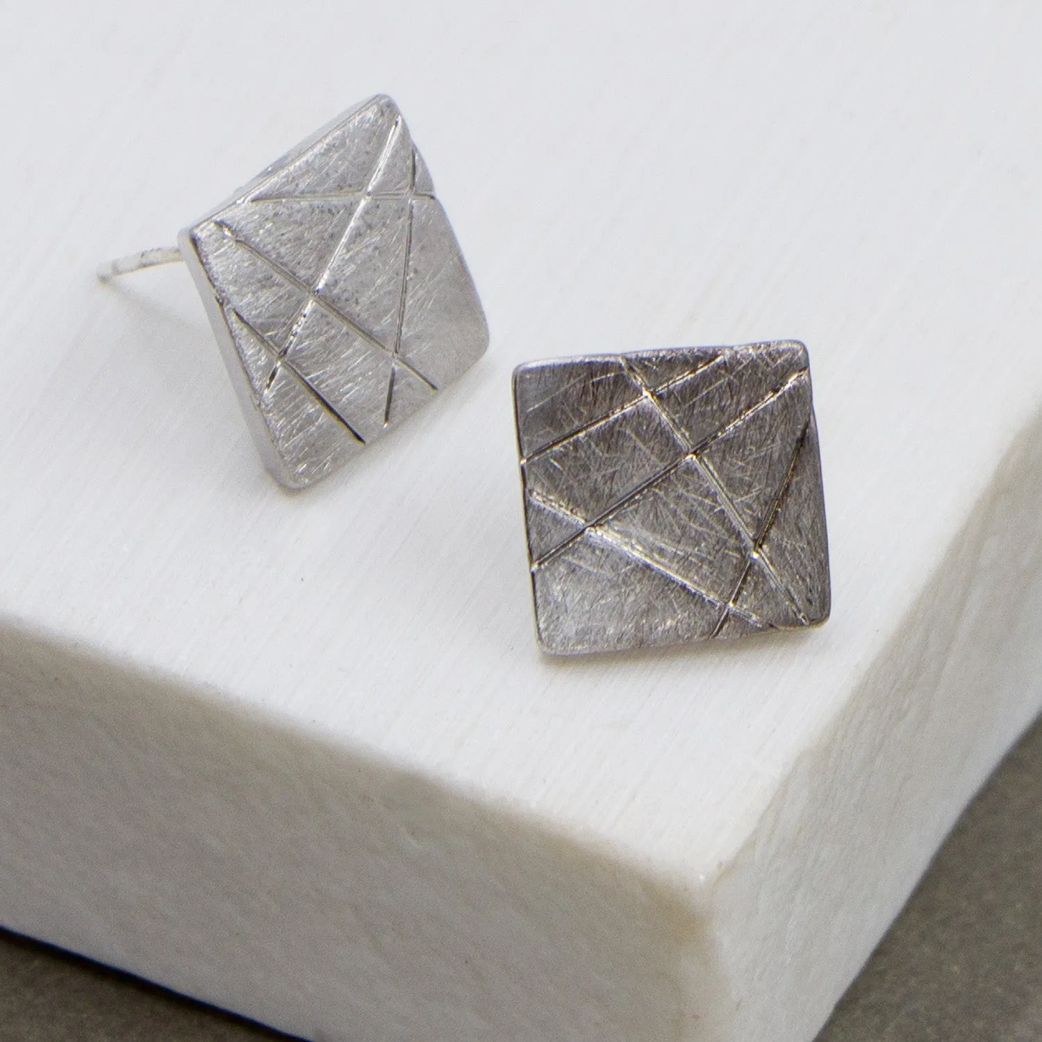 Square shaped brushed and scored contemporary earrings