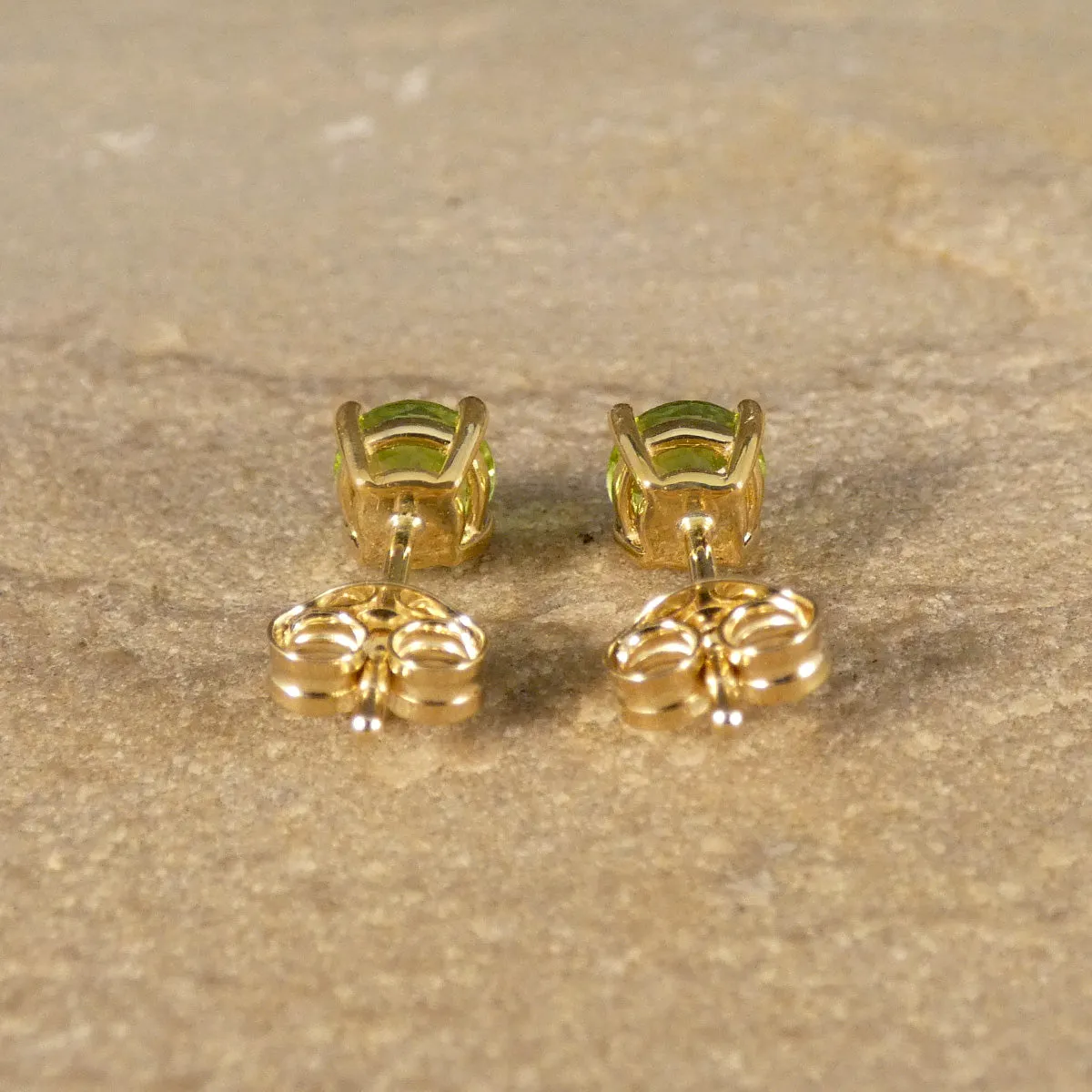 Vibrant Peridot Solitaire Stud Earrings in Yellow Gold